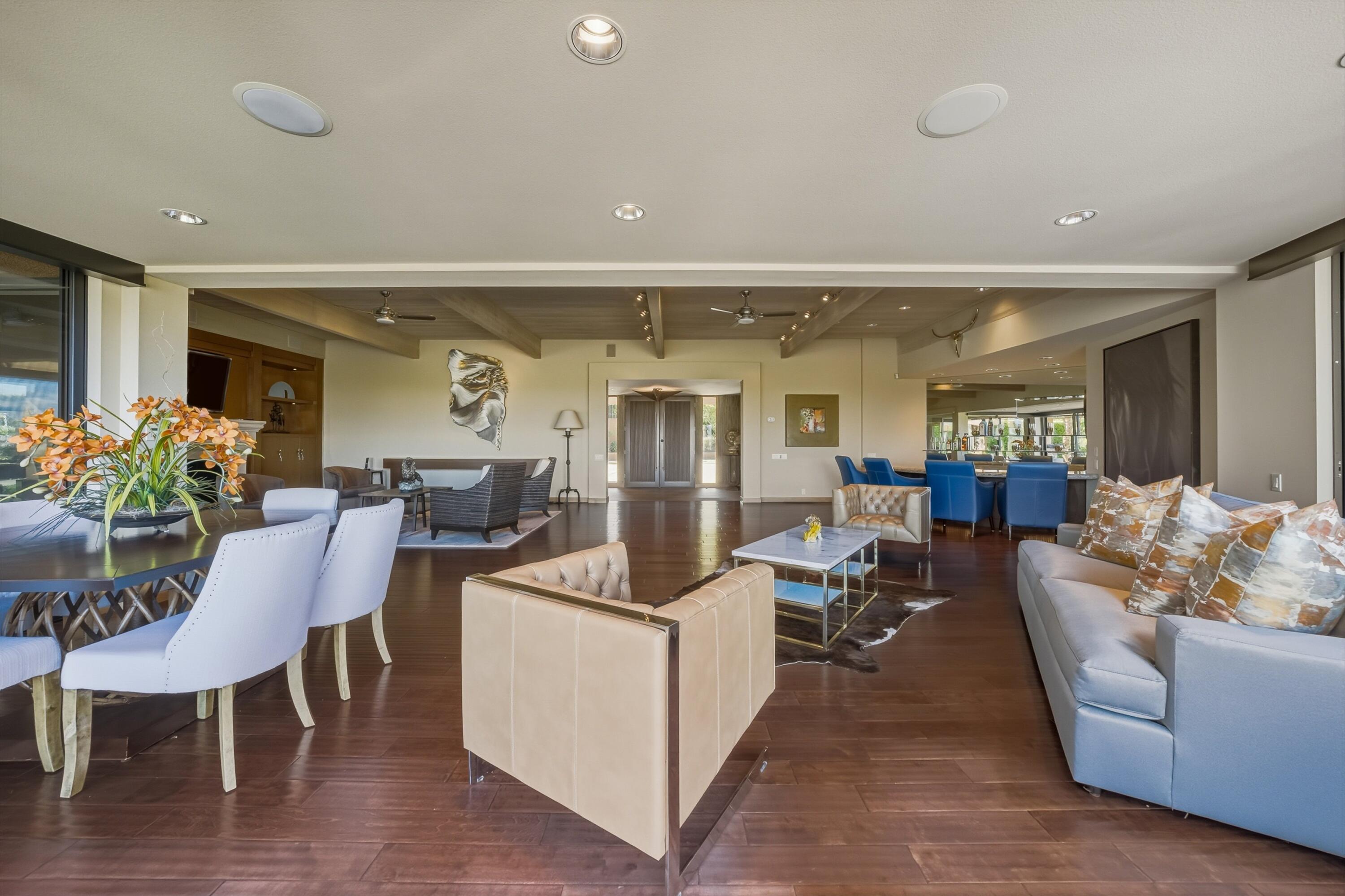 70150 Thunderbird Road Rancho Mirage, CA 92270 - Photo 18 of 67 a living room with furniture and wooden floor