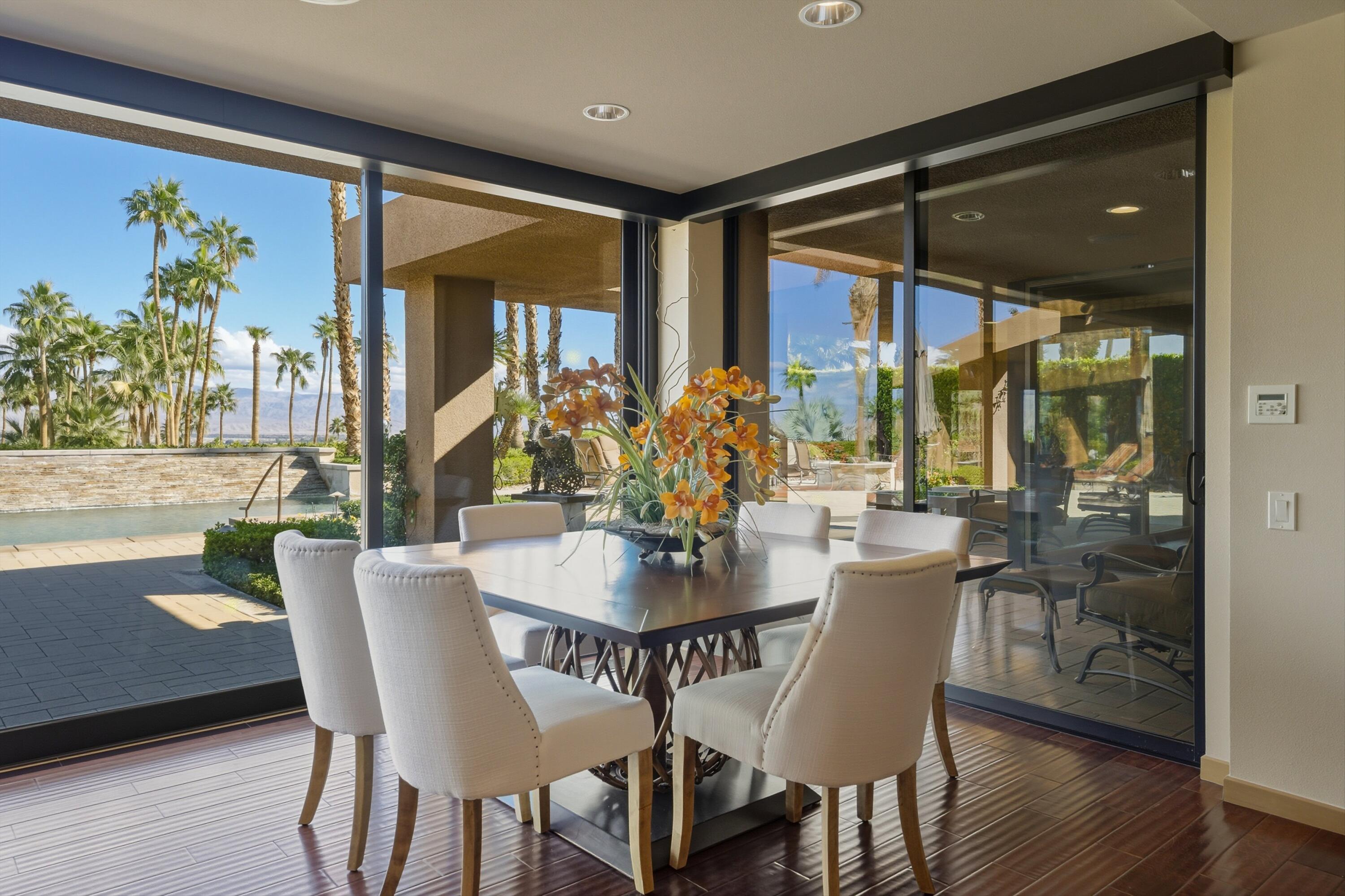 70150 Thunderbird Road Rancho Mirage, CA 92270 - Photo 20 of 67 a view of a dining room with furniture window and outside view