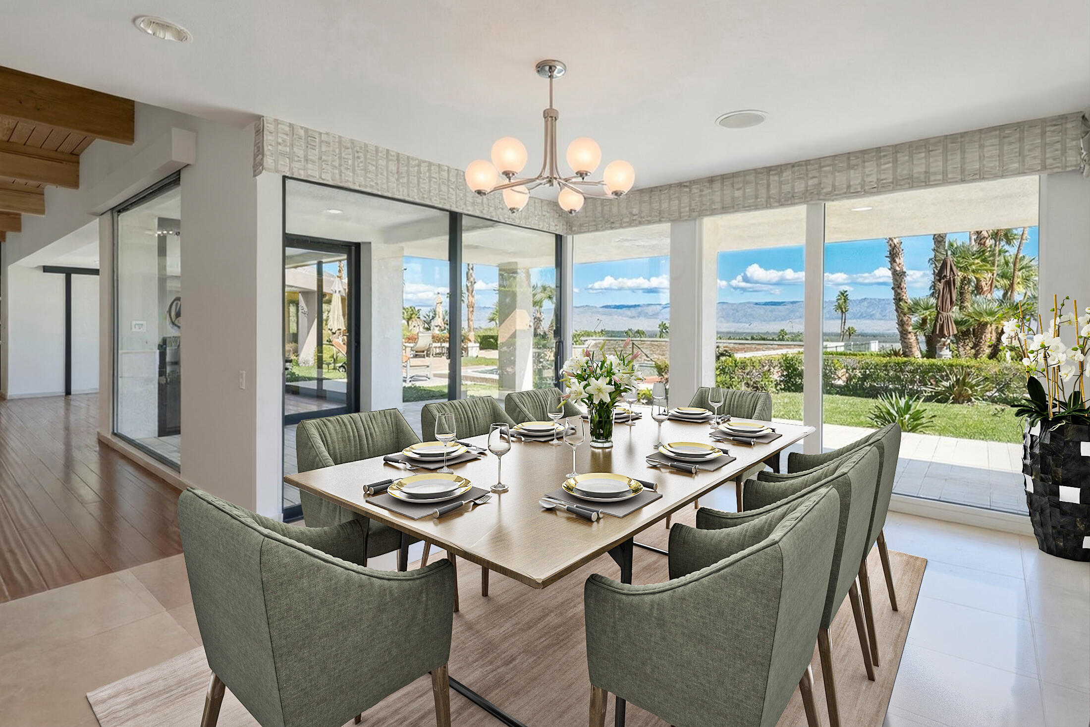 70150 Thunderbird Road Rancho Mirage, CA 92270 - Photo 23 of 67 a dining room with furniture a chandelier and wooden floor