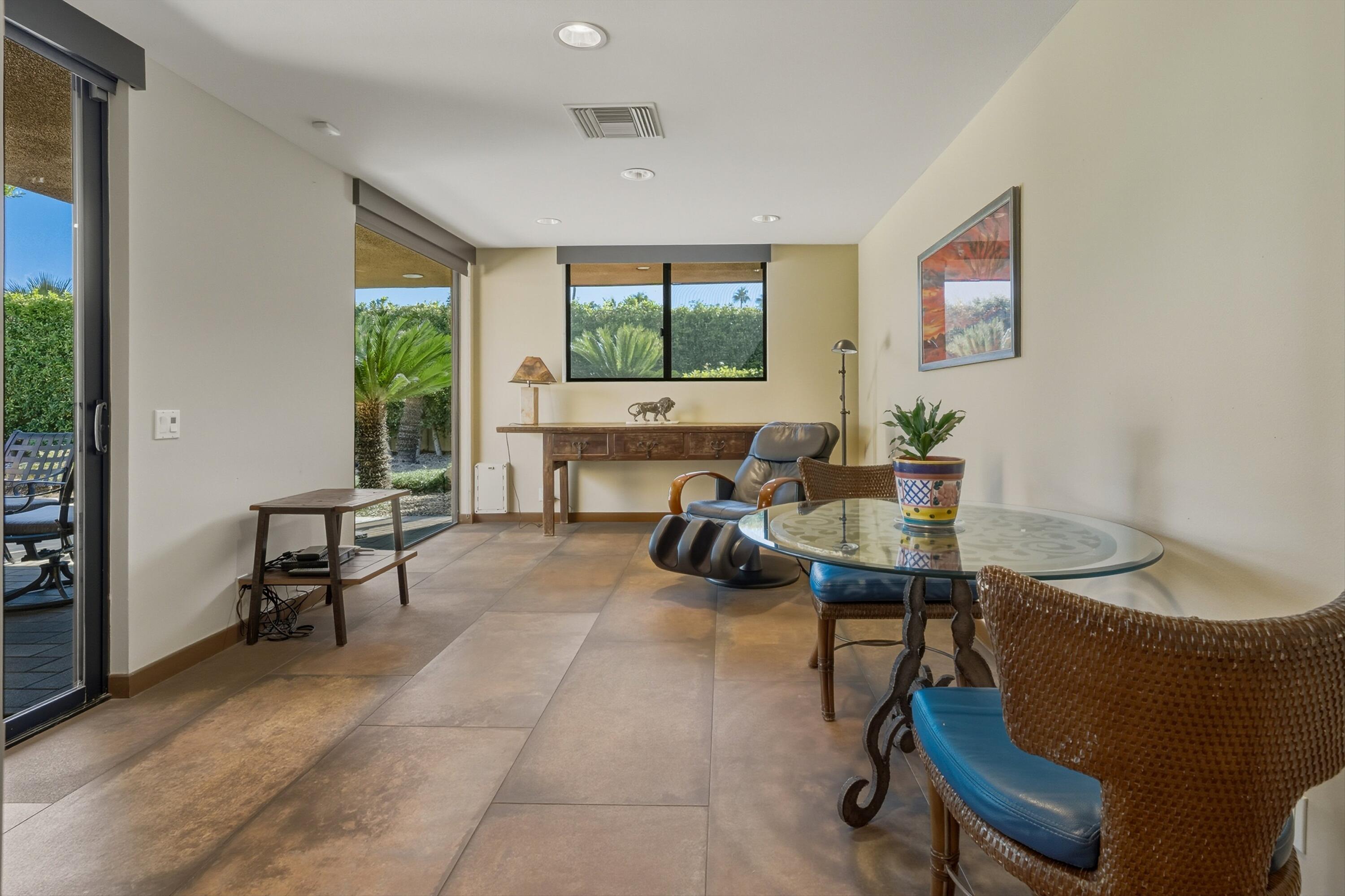 70150 Thunderbird Road Rancho Mirage, CA 92270 - Photo 29 of 67 a living room with furniture and a window