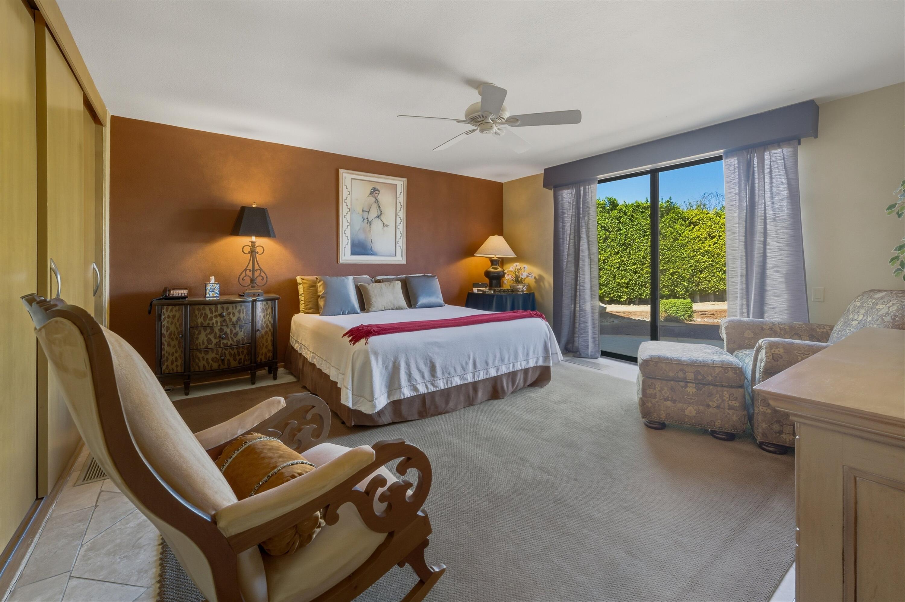 70150 Thunderbird Road Rancho Mirage, CA 92270 - Photo 46 of 67 a bedroom with two beds and a large window