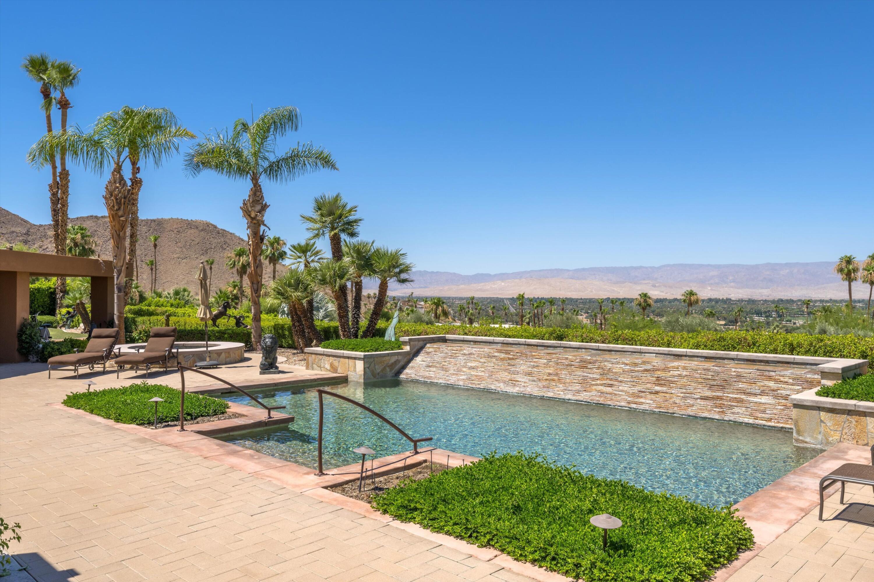 70150 Thunderbird Road Rancho Mirage, CA 92270 - Photo 53 of 67 a view of swimming pool with outdoor seating and plants