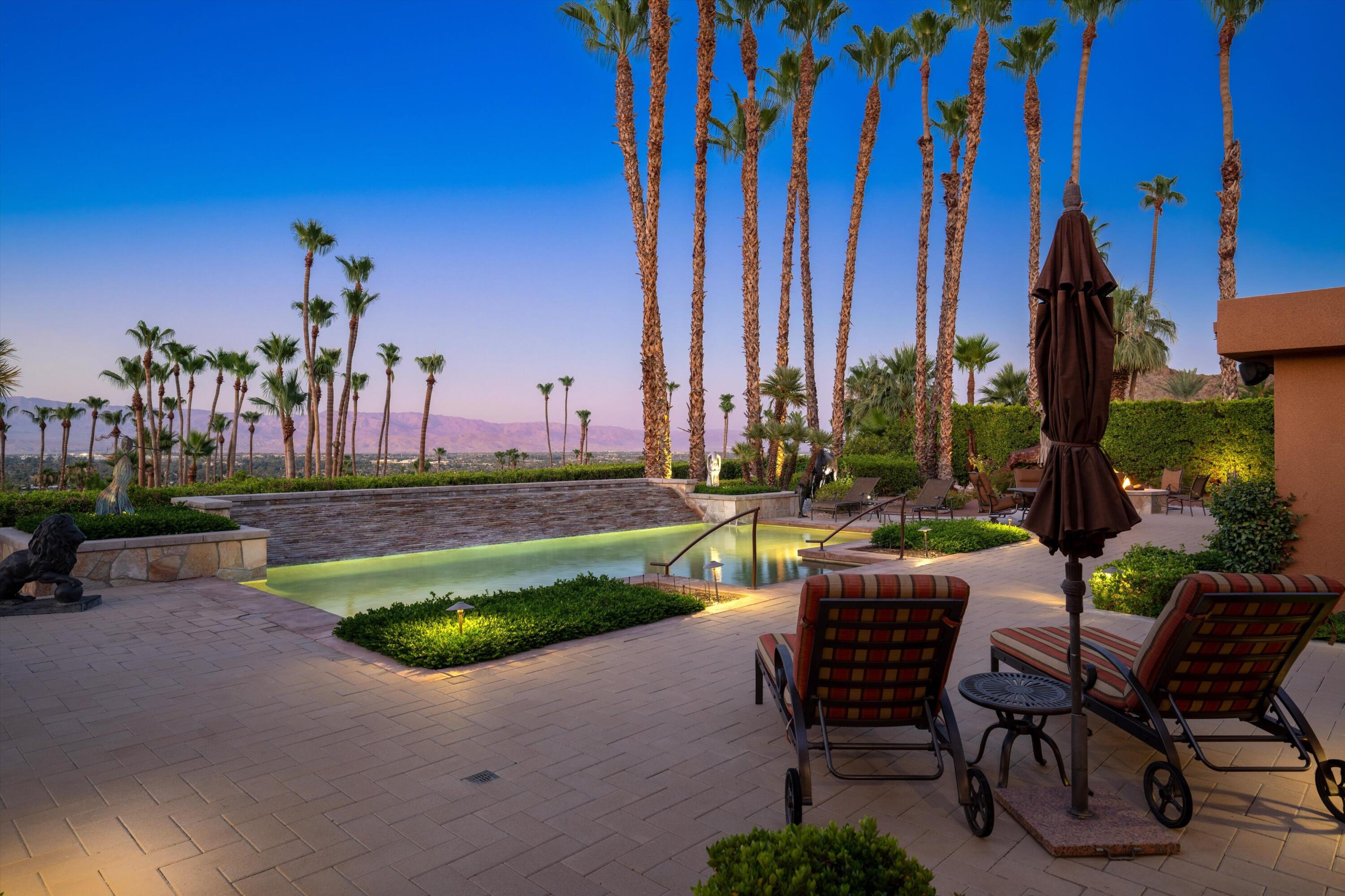 70150 Thunderbird Road Rancho Mirage, CA 92270 - Photo 6 of 67 a view of a patio with chairs and plants