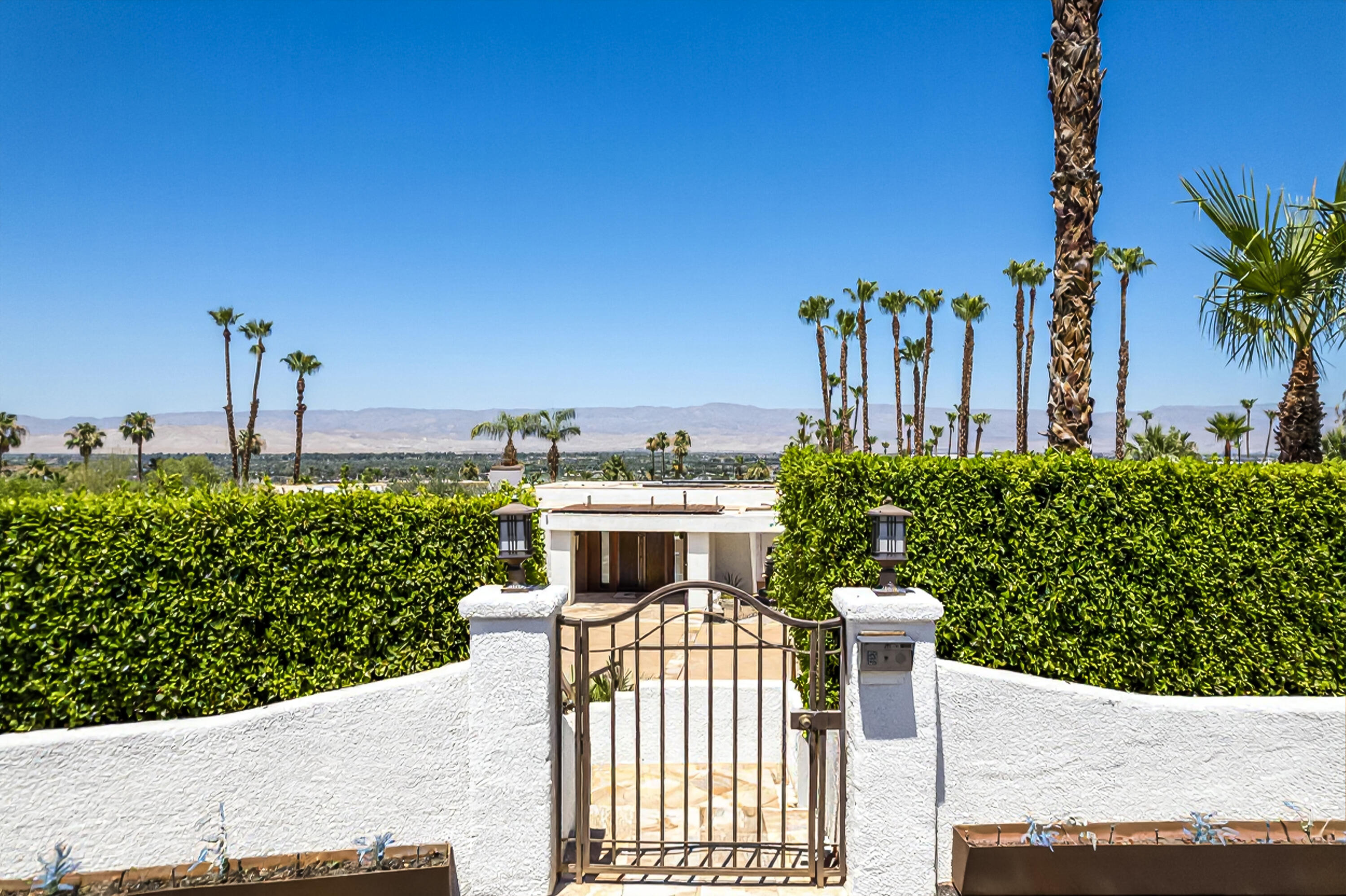 70150 Thunderbird Road Rancho Mirage, CA 92270 - Photo 67 of 67 a view of a house with a garden