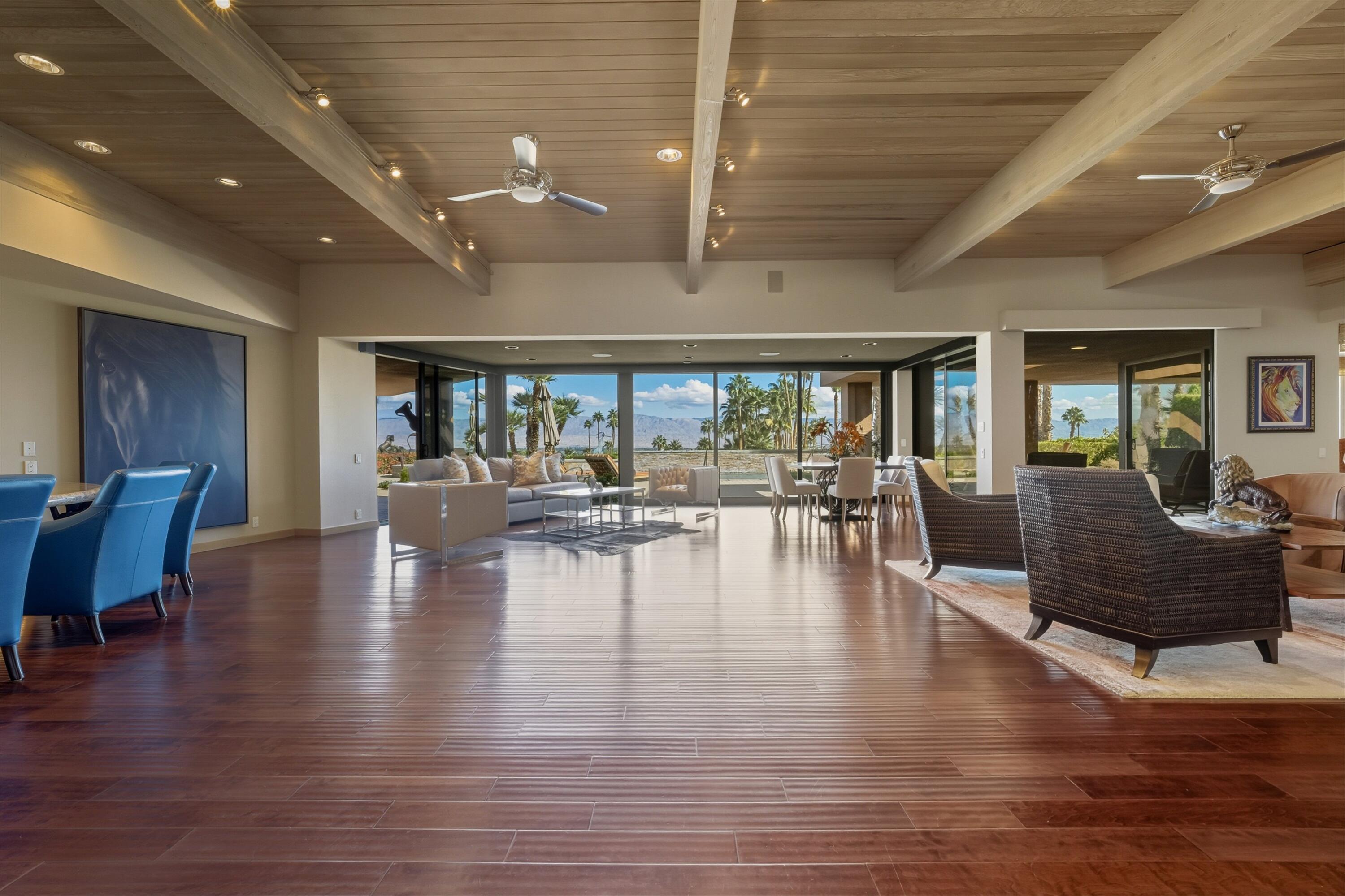 70150 Thunderbird Road Rancho Mirage, CA 92270 - Photo 10 of 67 a living room with furniture and wooden floor