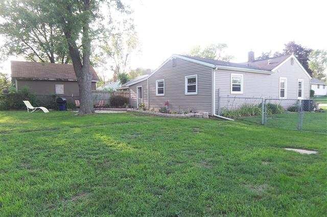 609 Barry Road Rockford, IL 61109 - Photo 3 of 14 a front view of a house with garden