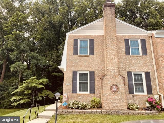 1016 Windrush Lane, Unit 25 Sandy Spring, MD 20860 - Photo 3 of 37 Charming brick home by lush greenery.