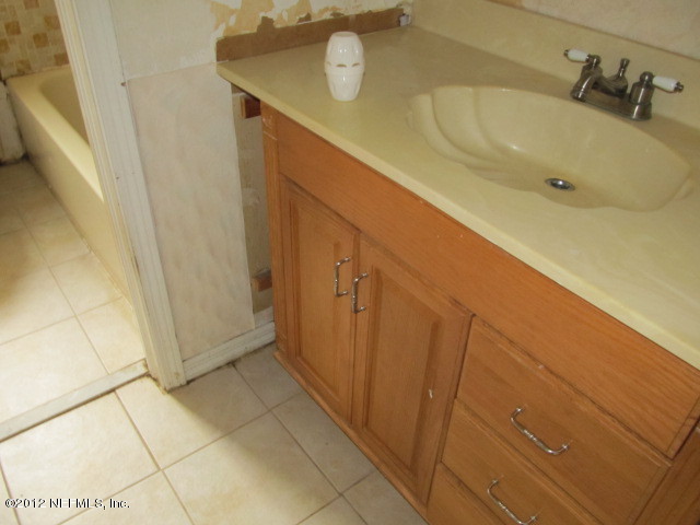 14049 Fortunado Road Jacksonville, FL 32225 - Photo 11 of 12 Hall Bathroom