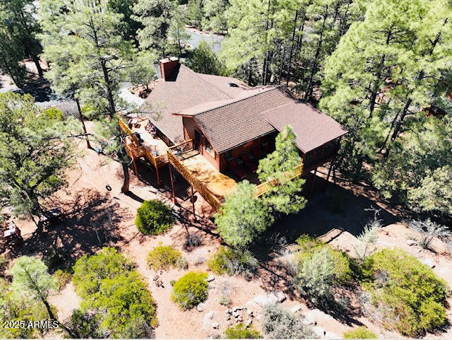 5579 Solitude Trail Loop Pine, AZ 85544 - Photo 43 of 50 a view of a house with a yard and a tree