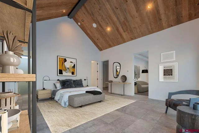 a bedroom with furniture and window