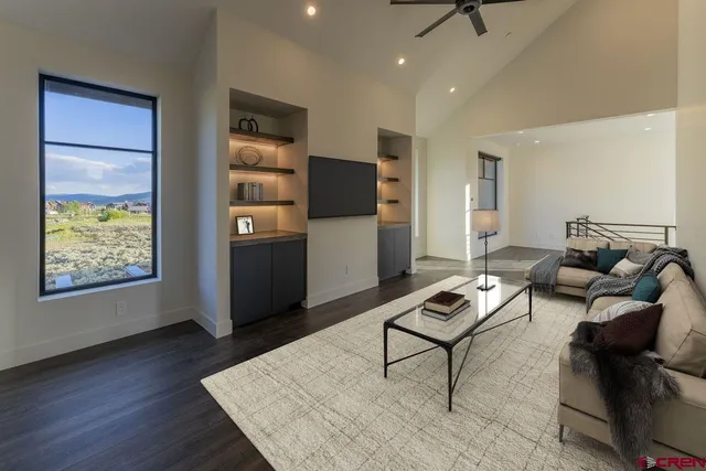 a living room with furniture and a window