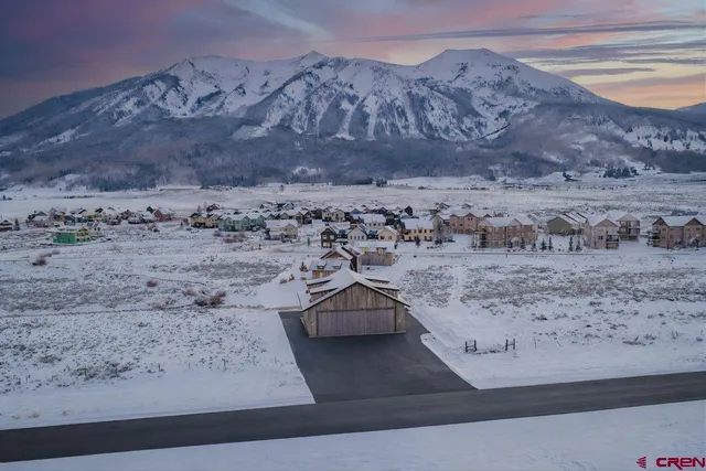 a view of wooden floor in middle of the road