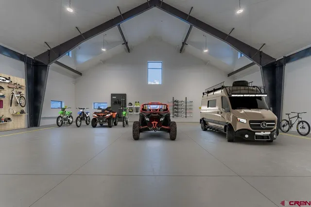 a view of house with backyard and outdoor seating