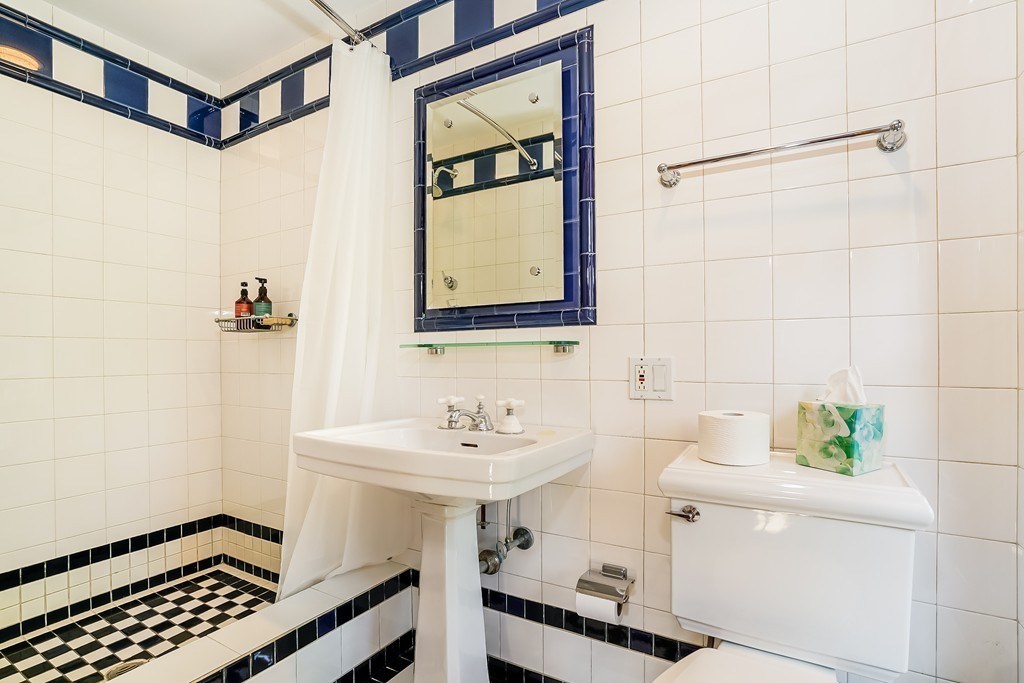 6 Brier Road Gloucester, MA 01930 - Photo 32 of 42 a bathroom with a sink and a mirror
