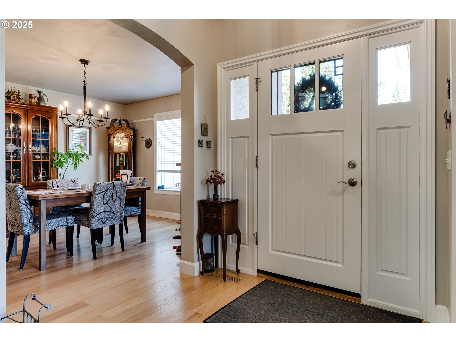 6111 Fernhill Loop Springfield, OR 97478 - Photo 11 of 48 a view interior of a house with dining area wooden floor a chandelier