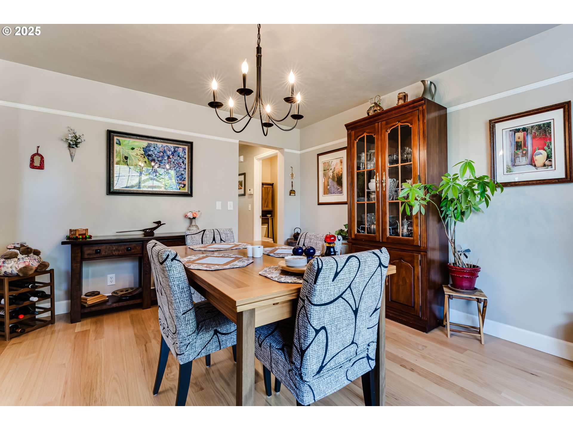 6111 Fernhill Loop Springfield, OR 97478 - Photo 15 of 48 a view of a dining room with furniture and chandelier