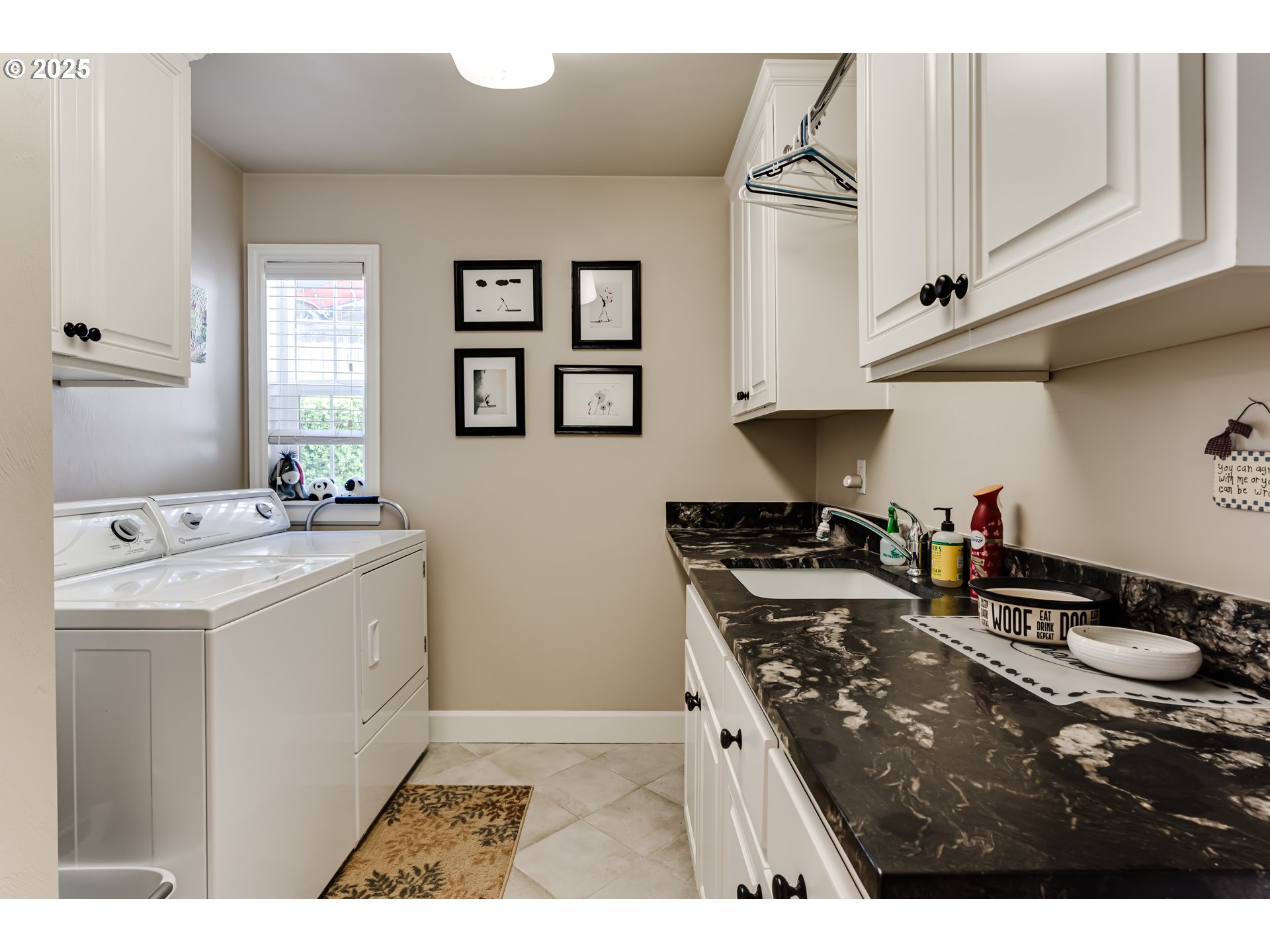 6111 Fernhill Loop Springfield, OR 97478 - Photo 24 of 48 a kitchen with a stove a sink and a refrigerator