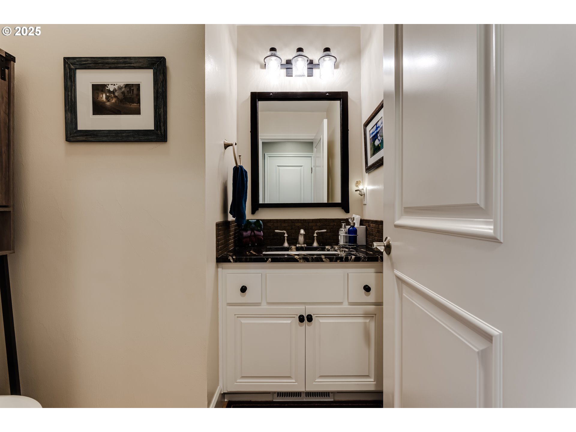 6111 Fernhill Loop Springfield, OR 97478 - Photo 25 of 48 a view of a hallway with washer and dryer