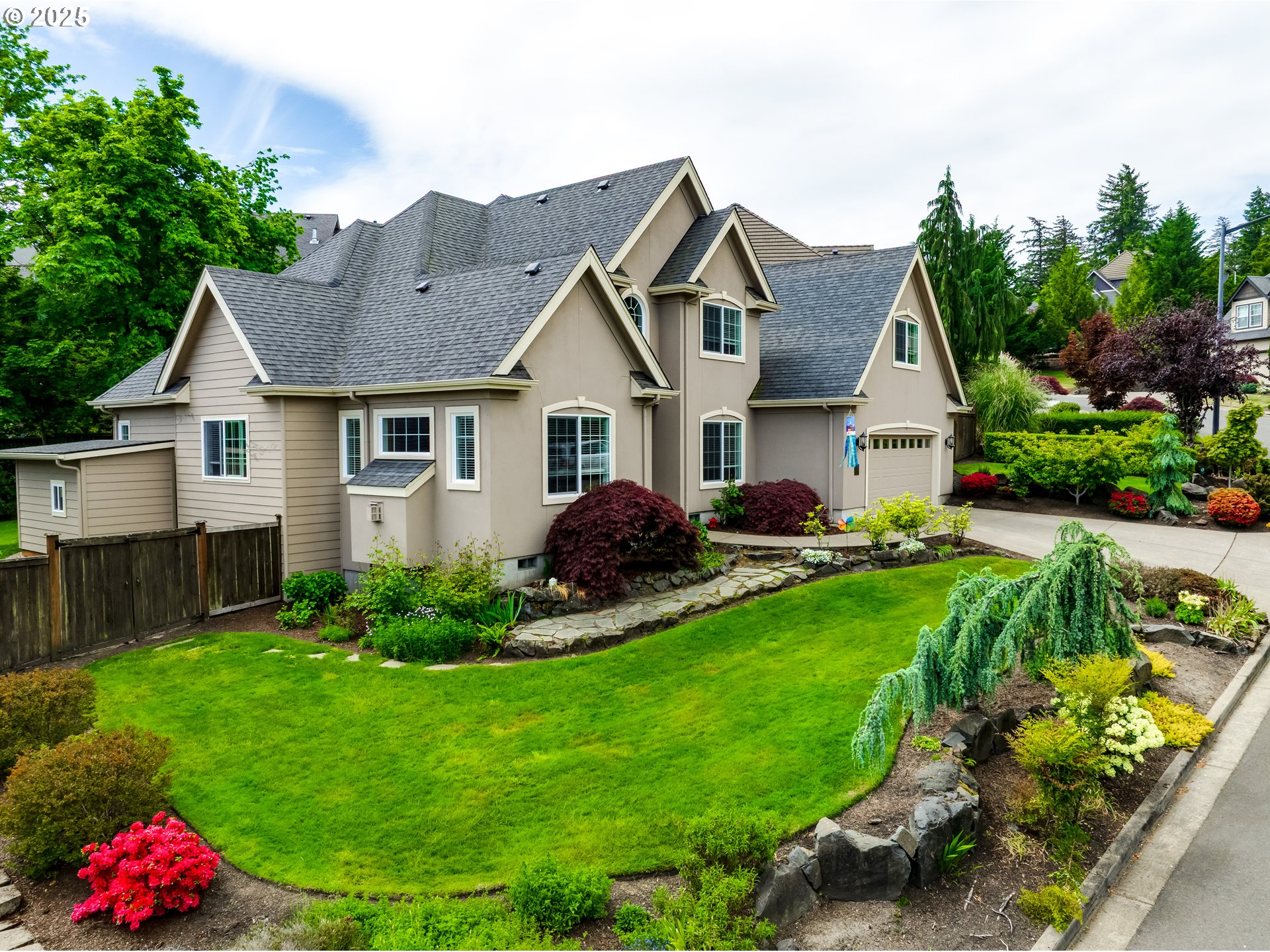 6111 Fernhill Loop Springfield, OR 97478 - Photo 3 of 48 a view of a house with a yard and potted plants