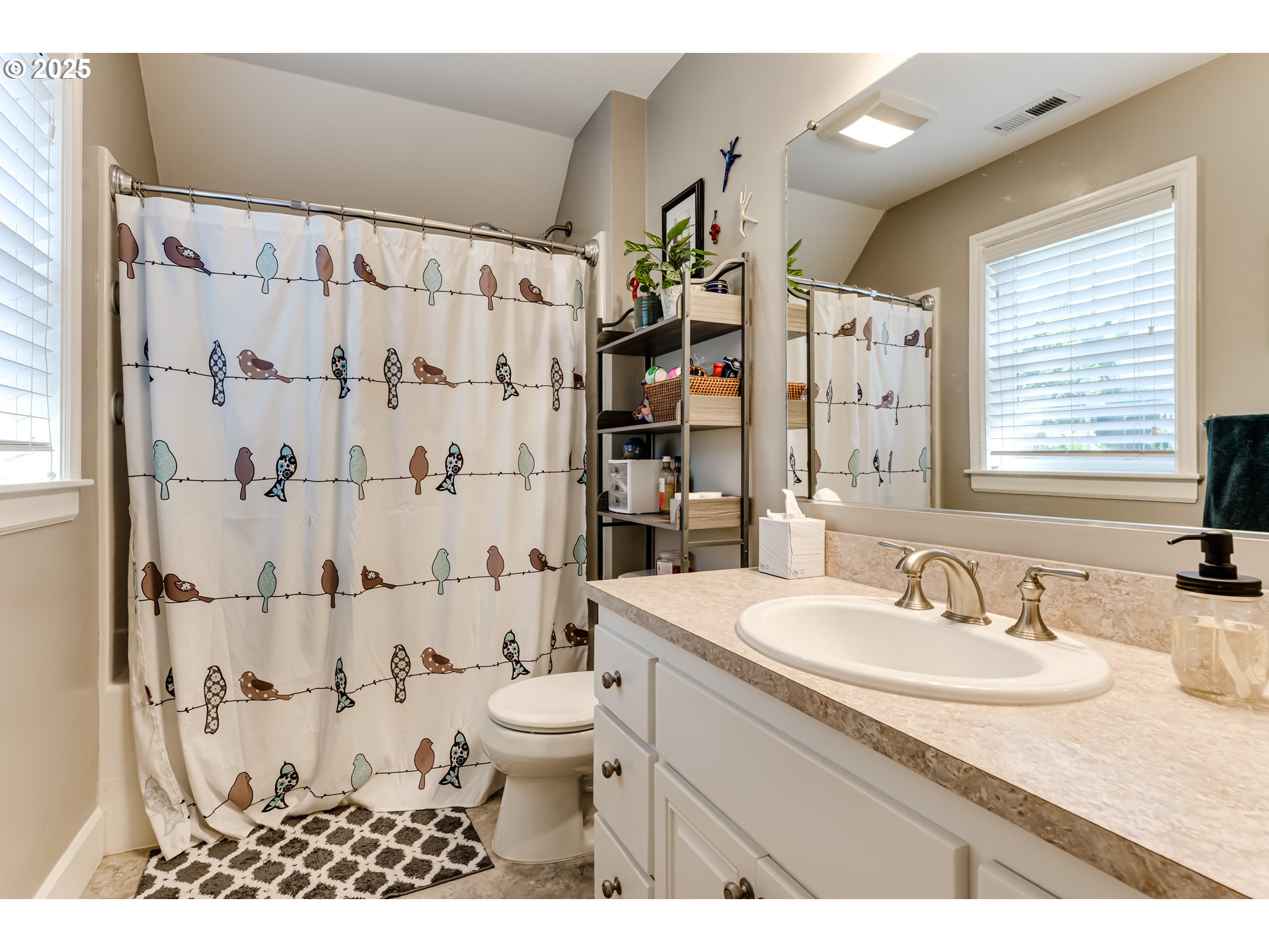 6111 Fernhill Loop Springfield, OR 97478 - Photo 37 of 48 a bathroom with a sink toilet double vanity and shower