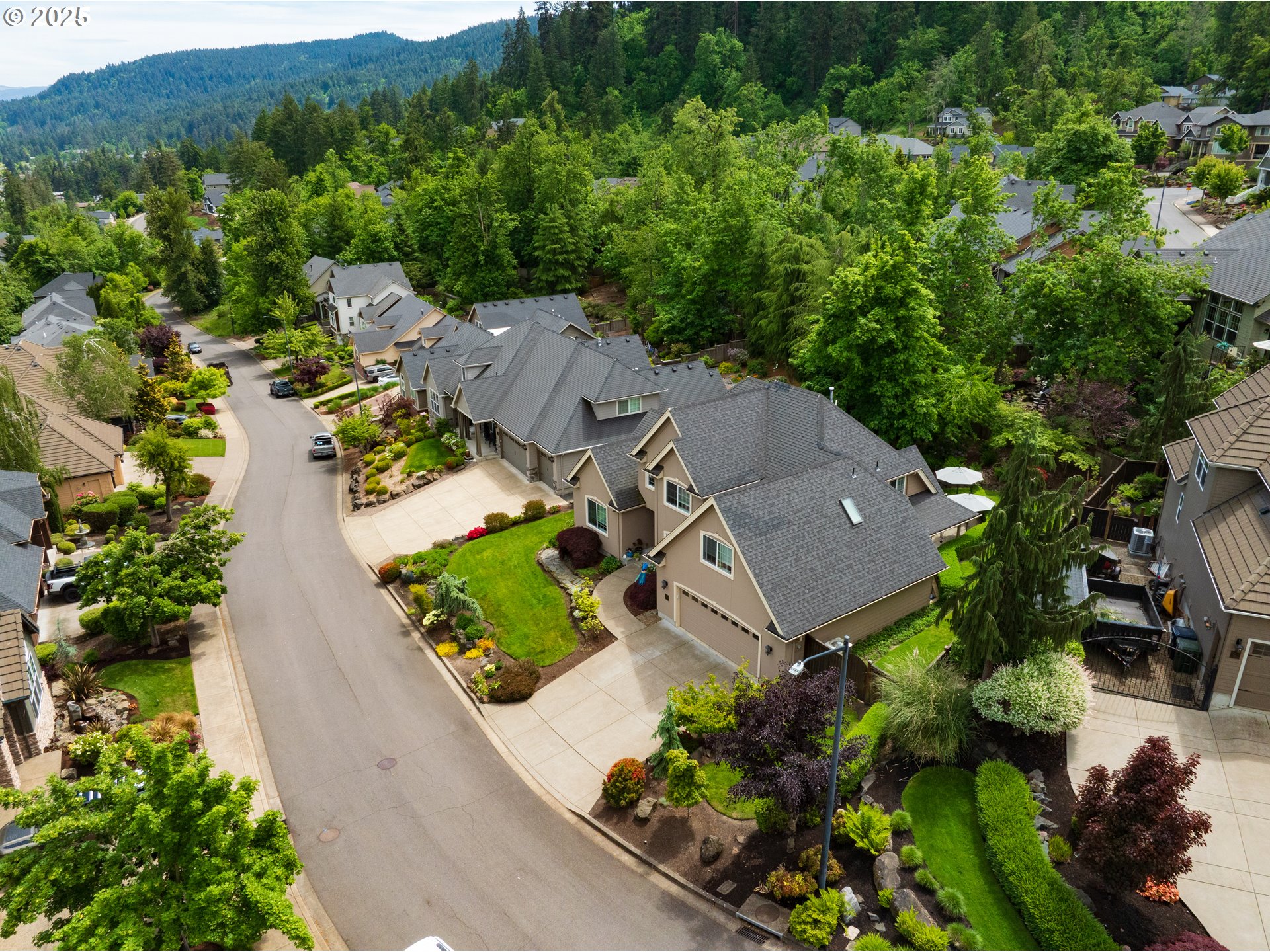 6111 Fernhill Loop Springfield, OR 97478 - Photo 6 of 48 an aerial view of a house with garden space and street view