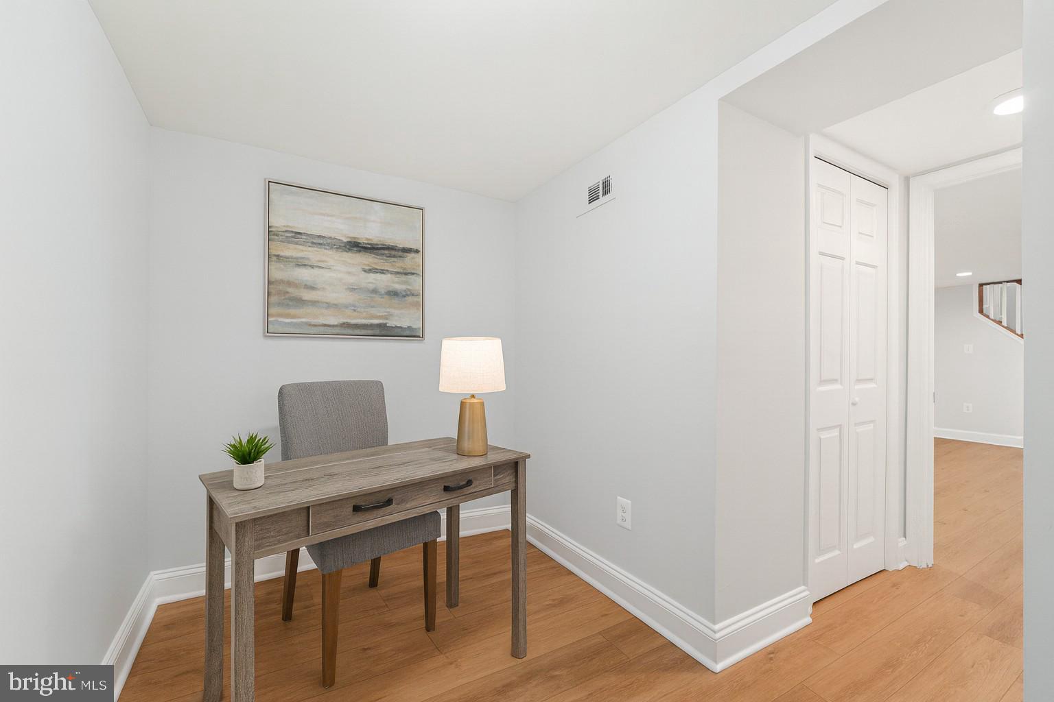 3030 Dunleer Road Dundalk, MD 21222 - Photo 14 of 26 a workspace with furniture and wooden floor