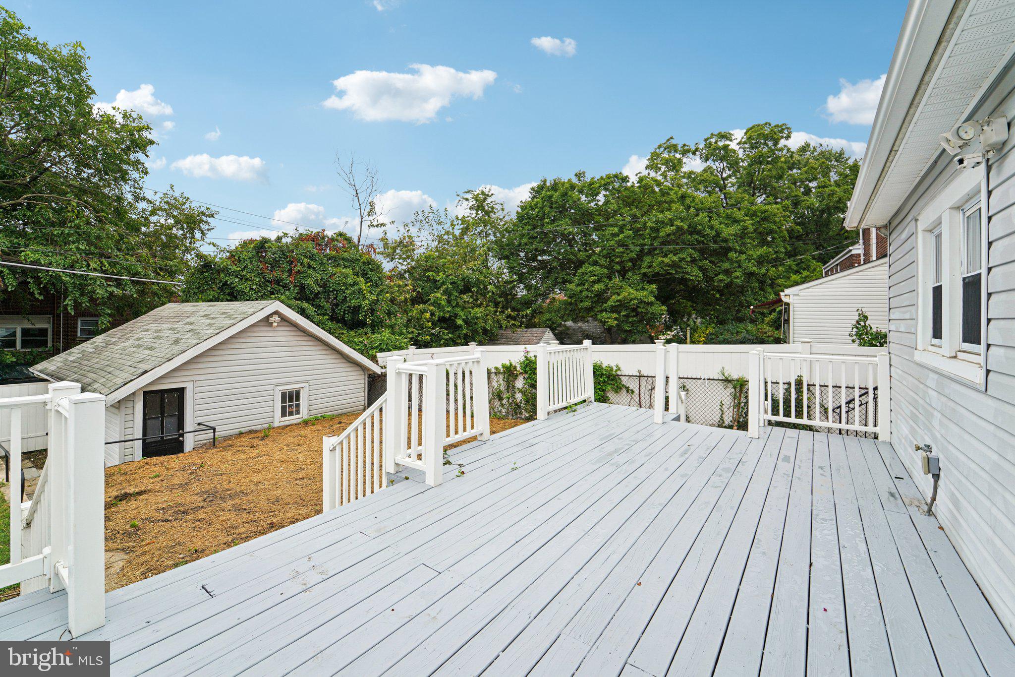 3030 Dunleer Road Dundalk, MD 21222 - Photo 24 of 26 a view of a house with backyard and sitting area