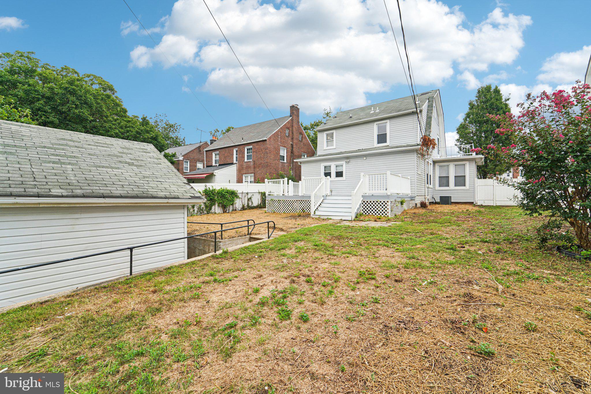 3030 Dunleer Road Dundalk, MD 21222 - Photo 25 of 26 a view of a house with a yard