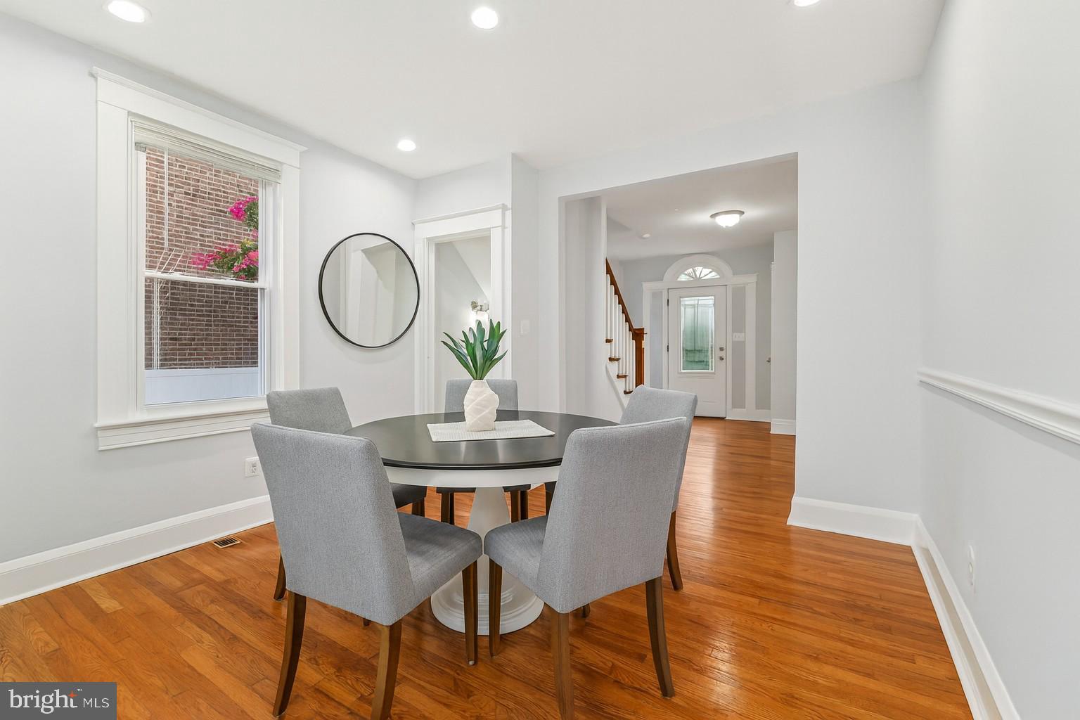 3030 Dunleer Road Dundalk, MD 21222 - Photo 9 of 26 a view of a dining room with furniture and wooden floor