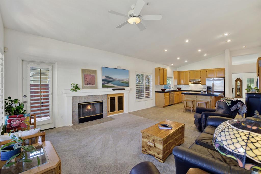 2022 Highland View Escondido, CA 92026 - Photo 15 of 47 a living room with furniture and a fireplace