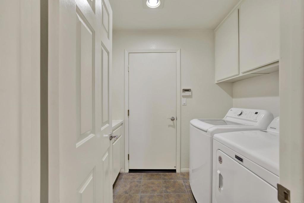 2022 Highland View Escondido, CA 92026 - Photo 16 of 47 a view of storage and utility room with washer and dryer