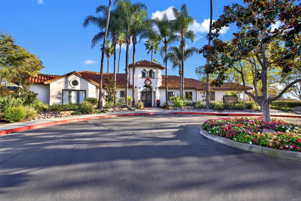 2022 Highland View Escondido, CA 92026 - Photo 32 of 47 a front view of multi story residential apartment building with yard and retail shops