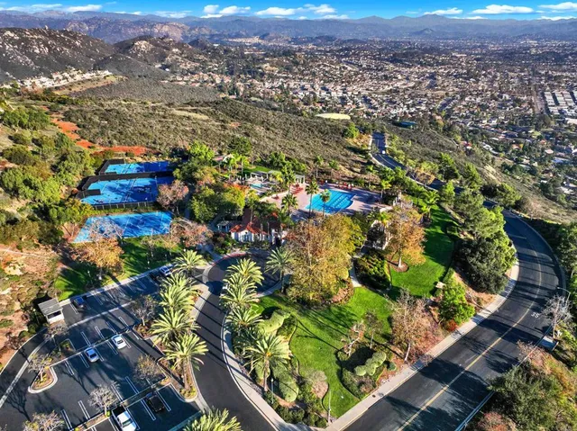 a view of a house with sitting area and garden