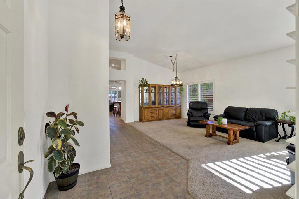 2022 Highland View Escondido, CA 92026 - Photo 7 of 47 a living room with furniture and a potted plant