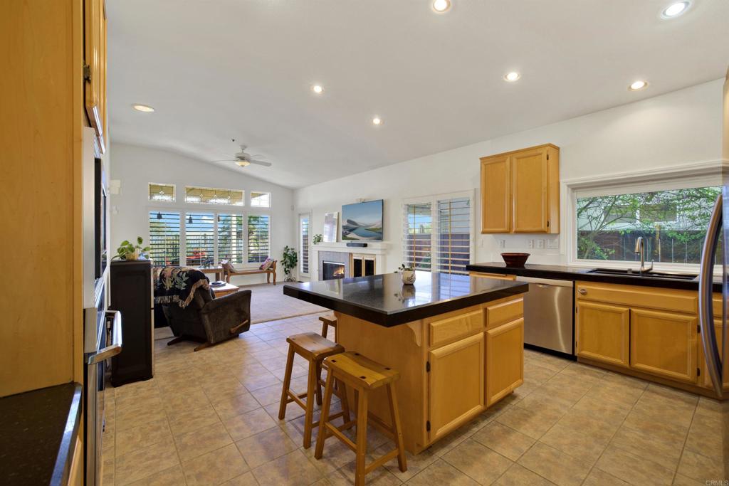 2022 Highland View Escondido, CA 92026 - Photo 9 of 47 a kitchen with stainless steel appliances granite countertop sink stove and cabinets