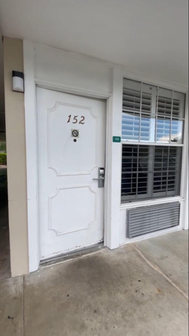 a view of a house with a large window