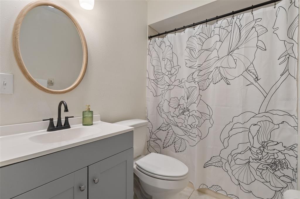 4325 South Canton Terrace Inverness, FL 34452 - Photo 13 of 35 a bathroom with a toilet sink and mirror