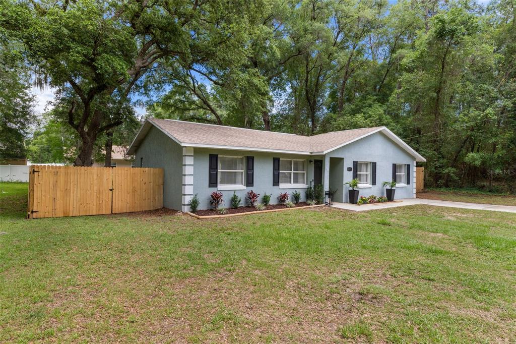 4325 South Canton Terrace Inverness, FL 34452 - Photo 25 of 35 a front view of a house with yard and porch