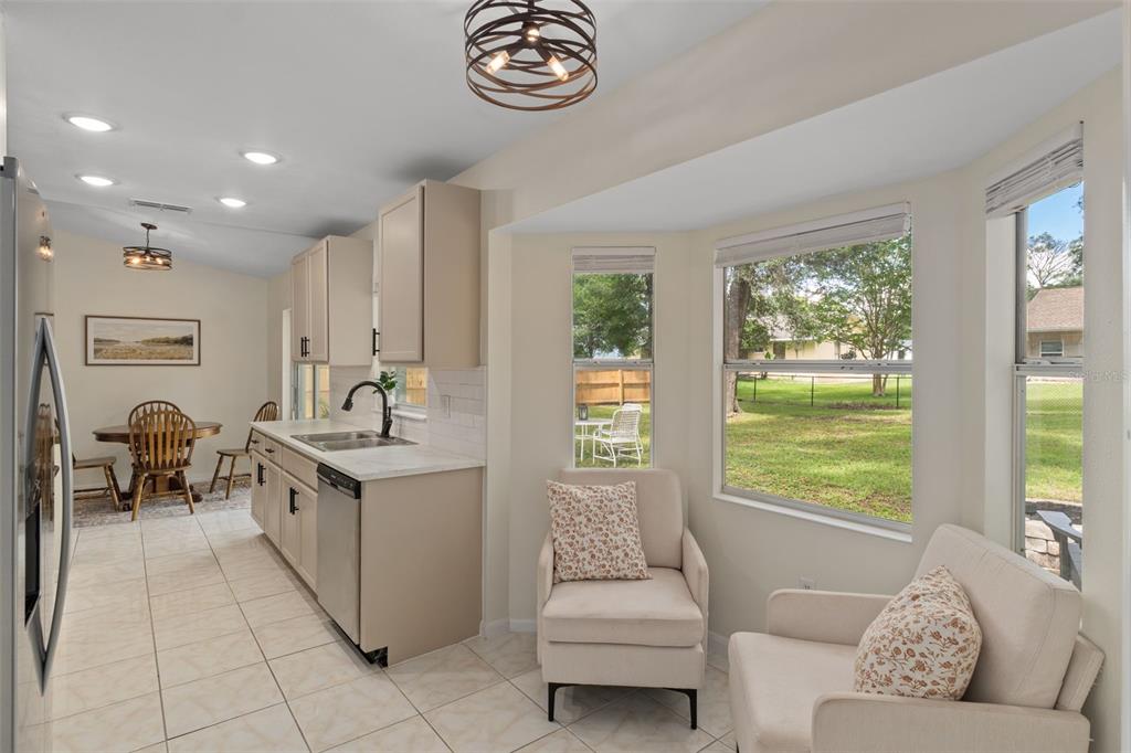 4325 South Canton Terrace Inverness, FL 34452 - Photo 6 of 35 a living room with furniture and a large window