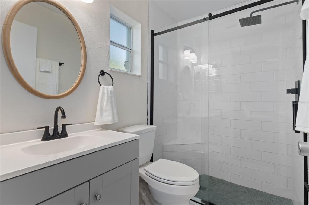 4325 South Canton Terrace Inverness, FL 34452 - Photo 8 of 35 a bathroom with a sink a toilet and a mirror