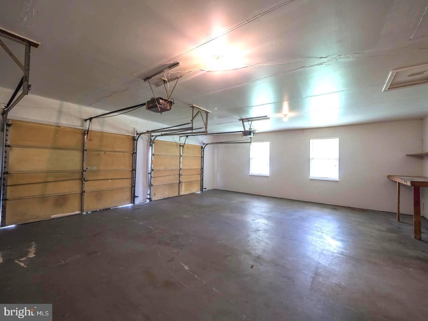 7701 Croom Road Upper Marlboro, MD 20772 - Photo 34 of 53 Spacious garage with ample natural light.