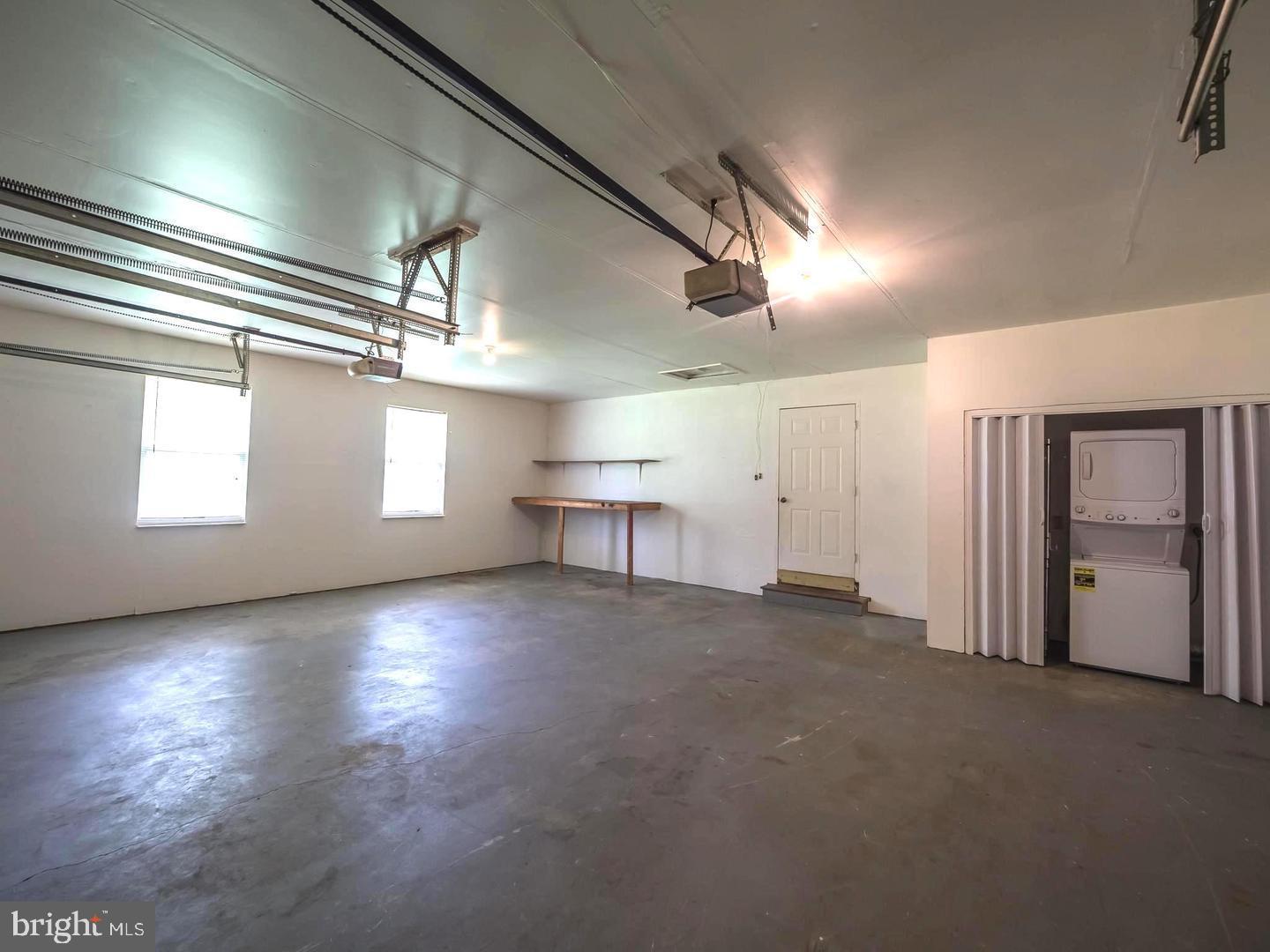 7701 Croom Road Upper Marlboro, MD 20772 - Photo 35 of 53 Spacious garage with natural light.