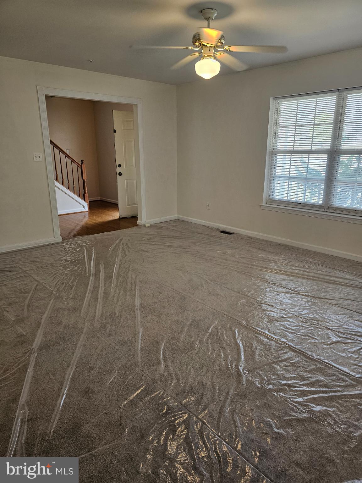 7701 Croom Road Upper Marlboro, MD 20772 - Photo 37 of 53 Living room showing new carpet
