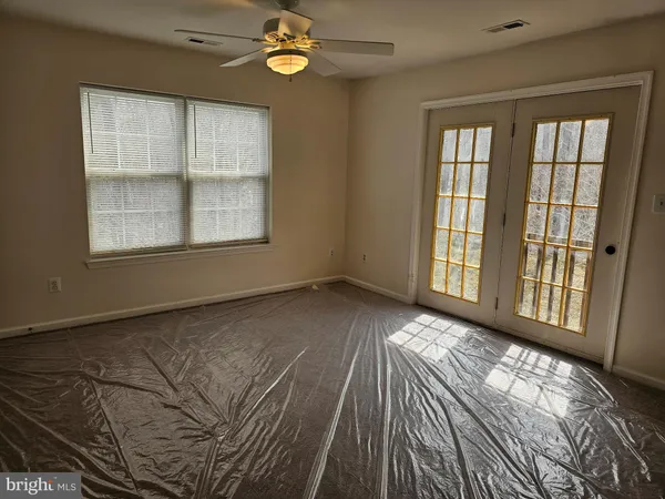 a view of a room with racks on the wall
