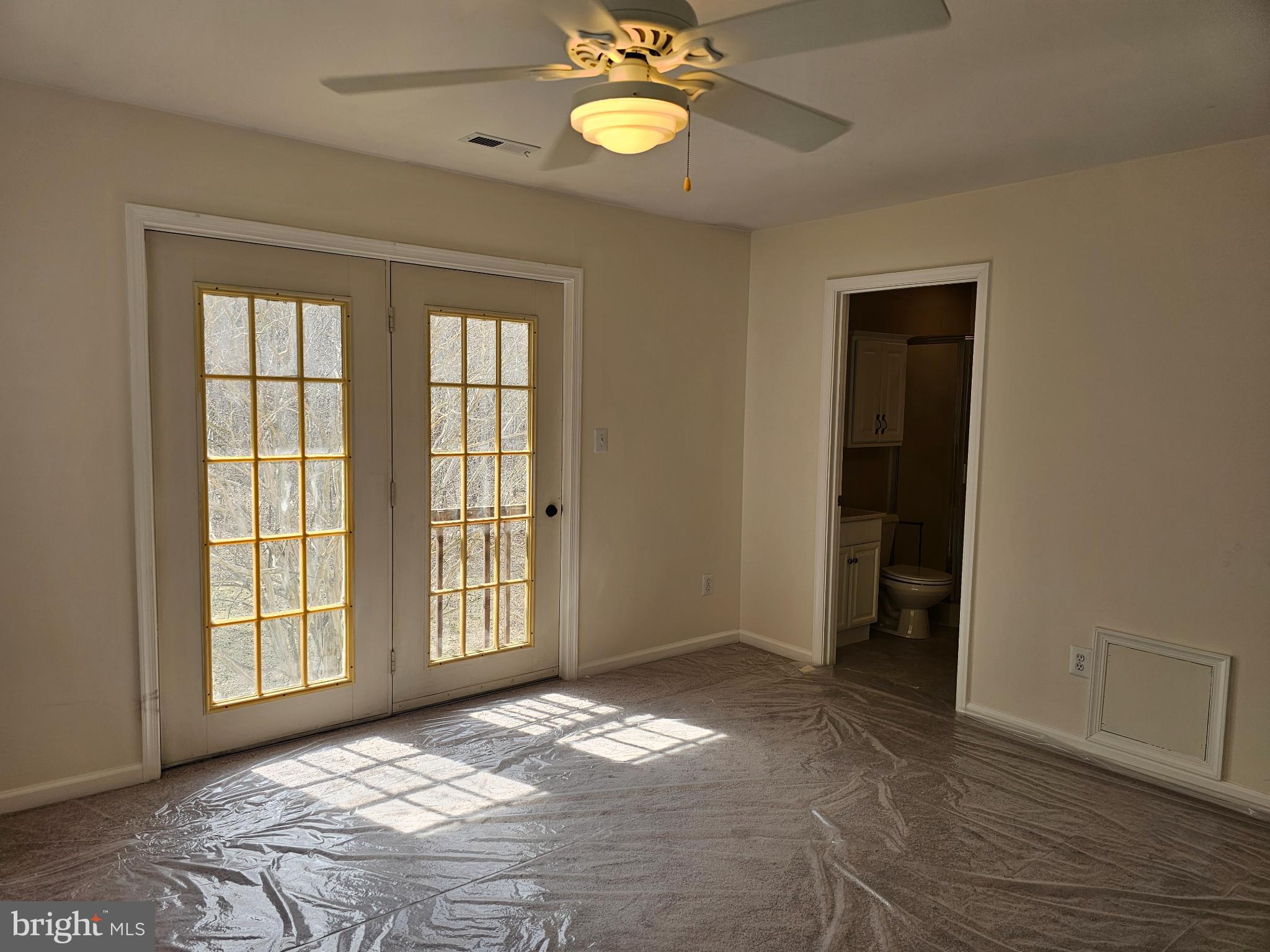 7701 Croom Road Upper Marlboro, MD 20772 - Photo 47 of 53 Bright and airy room with French doors.