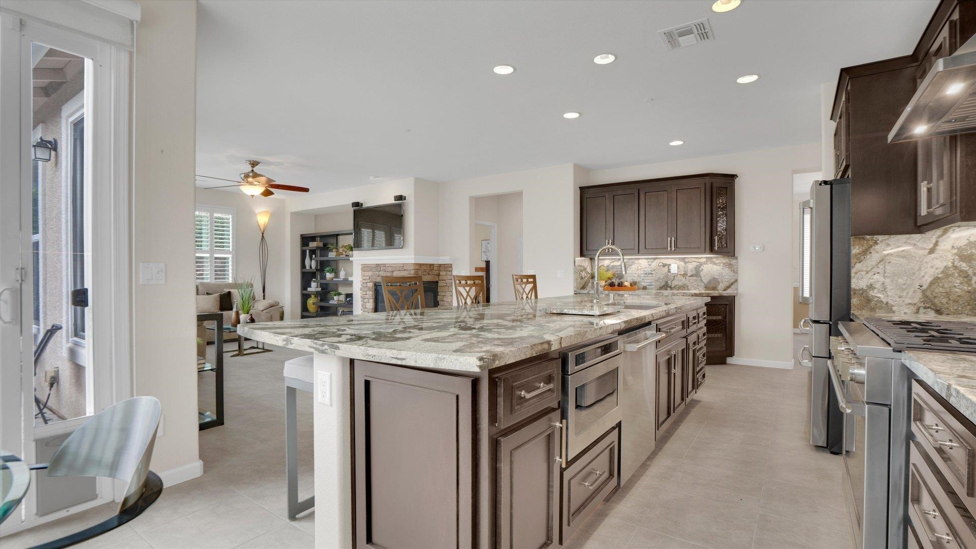 499 Twin Lakes Lane Rio Vista, CA 94571 - Photo 15 of 32 a kitchen with stainless steel appliances granite countertop a stove oven and a refrigerator