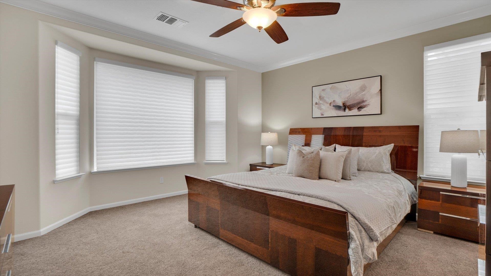 499 Twin Lakes Lane Rio Vista, CA 94571 - Photo 17 of 32 a bedroom with a bed and a large window