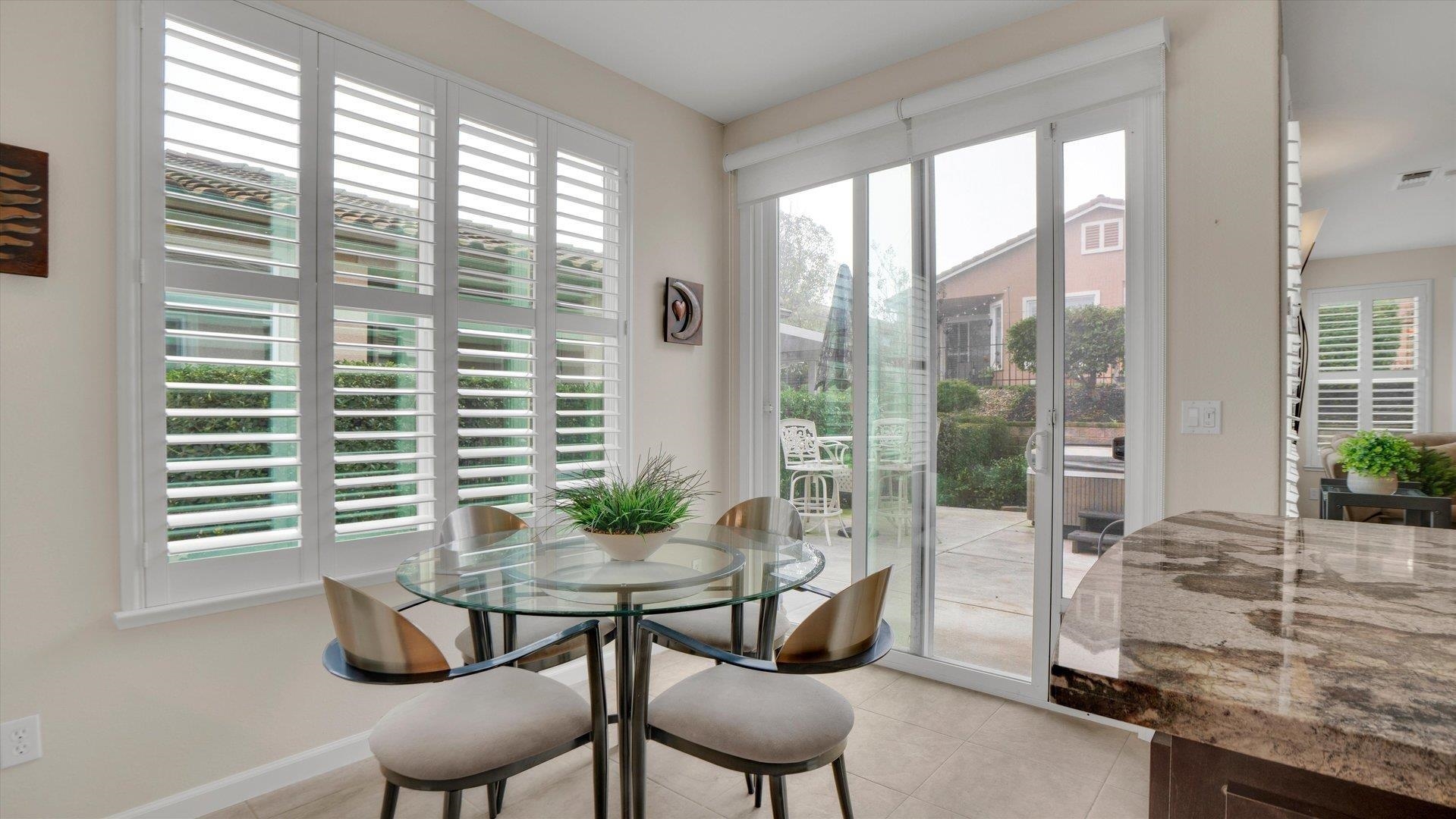 499 Twin Lakes Lane Rio Vista, CA 94571 - Photo 25 of 32 a dining room with furniture and large windows