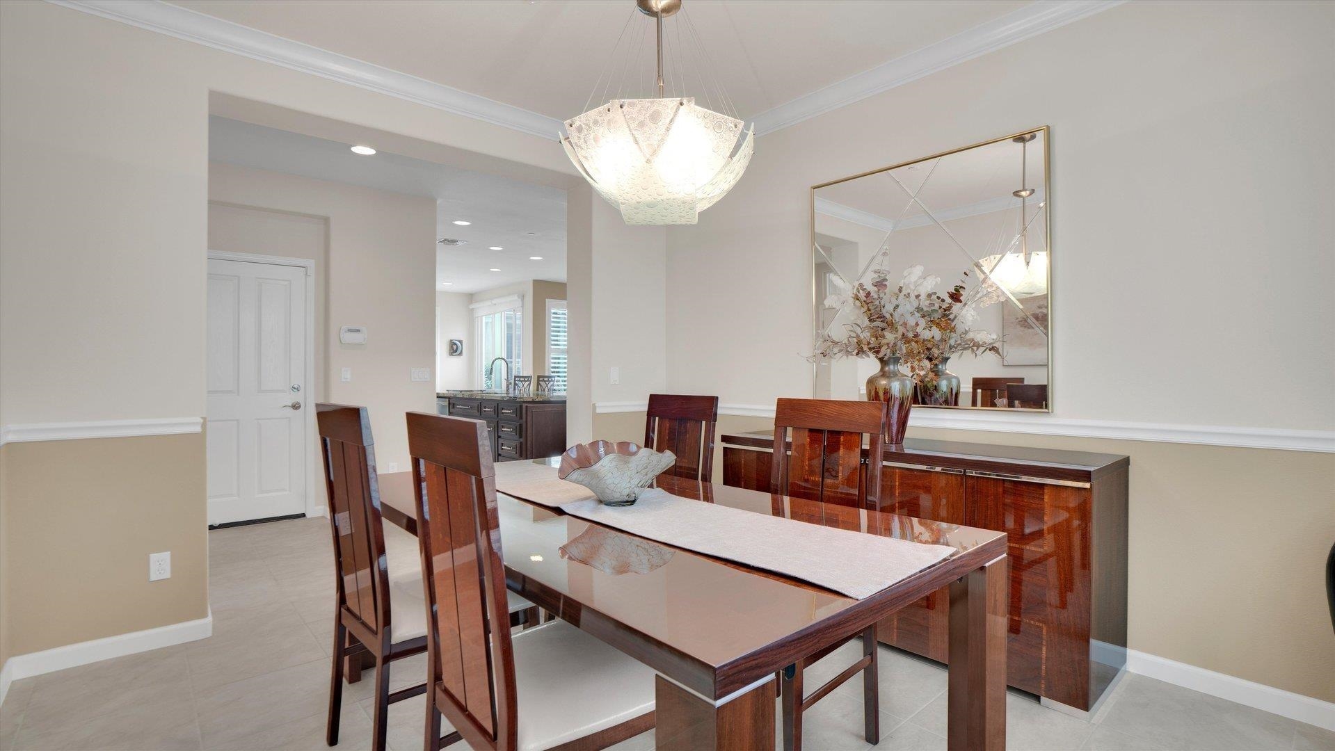 499 Twin Lakes Lane Rio Vista, CA 94571 - Photo 6 of 32 a view of a dining room with furniture and chandelier
