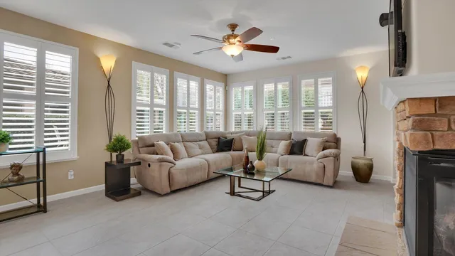 a kitchen with granite countertop a sink and a stove